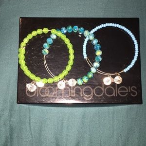 Set of 3 Alex and Ani bangle bracelets.